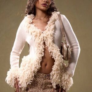 Chic Cream Cardigan with Fringe Accents